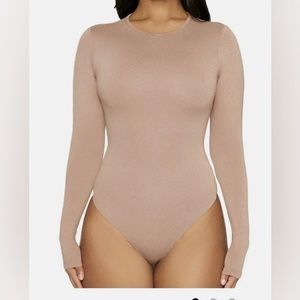 Naked Wardrobe Got U in a Bind Bodysuit